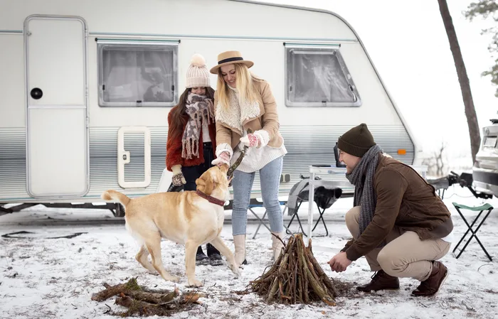 Family trying to dewinterize a camper